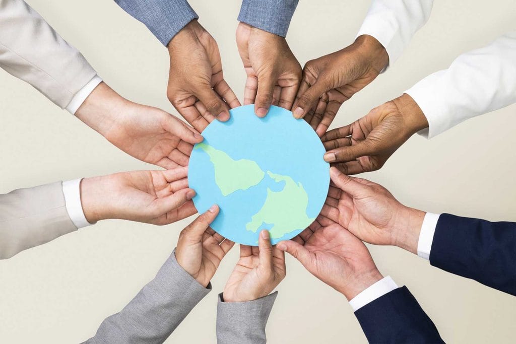 hands holding earth csr business campaign min min4