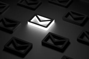 white luminous envelope with letter among dark envelopes blur concept important letter new letter 3d render 1